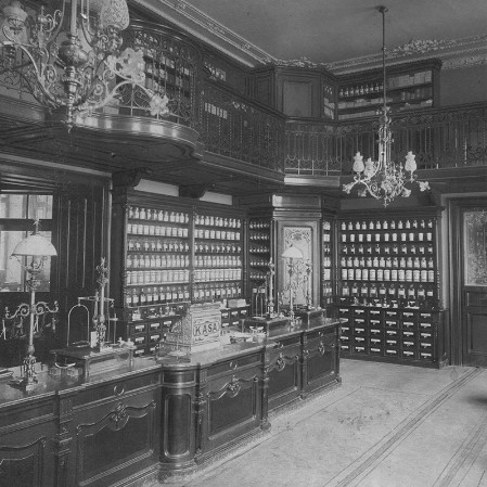 The interior of Under the Gold Star Pharmacy of Piotr Mikolasch, an  archival photo.
